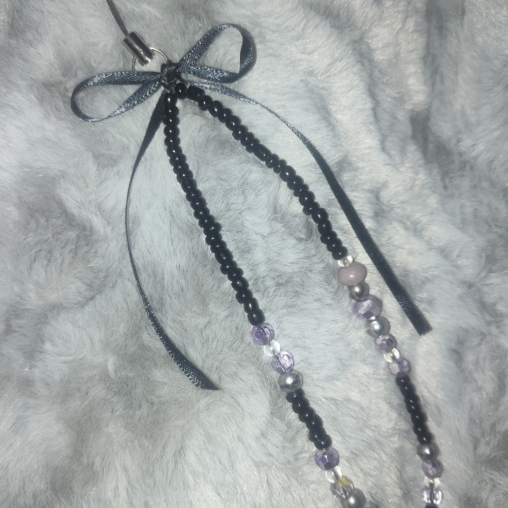 Elegant Beaded Necklace with Black and Purple Accents